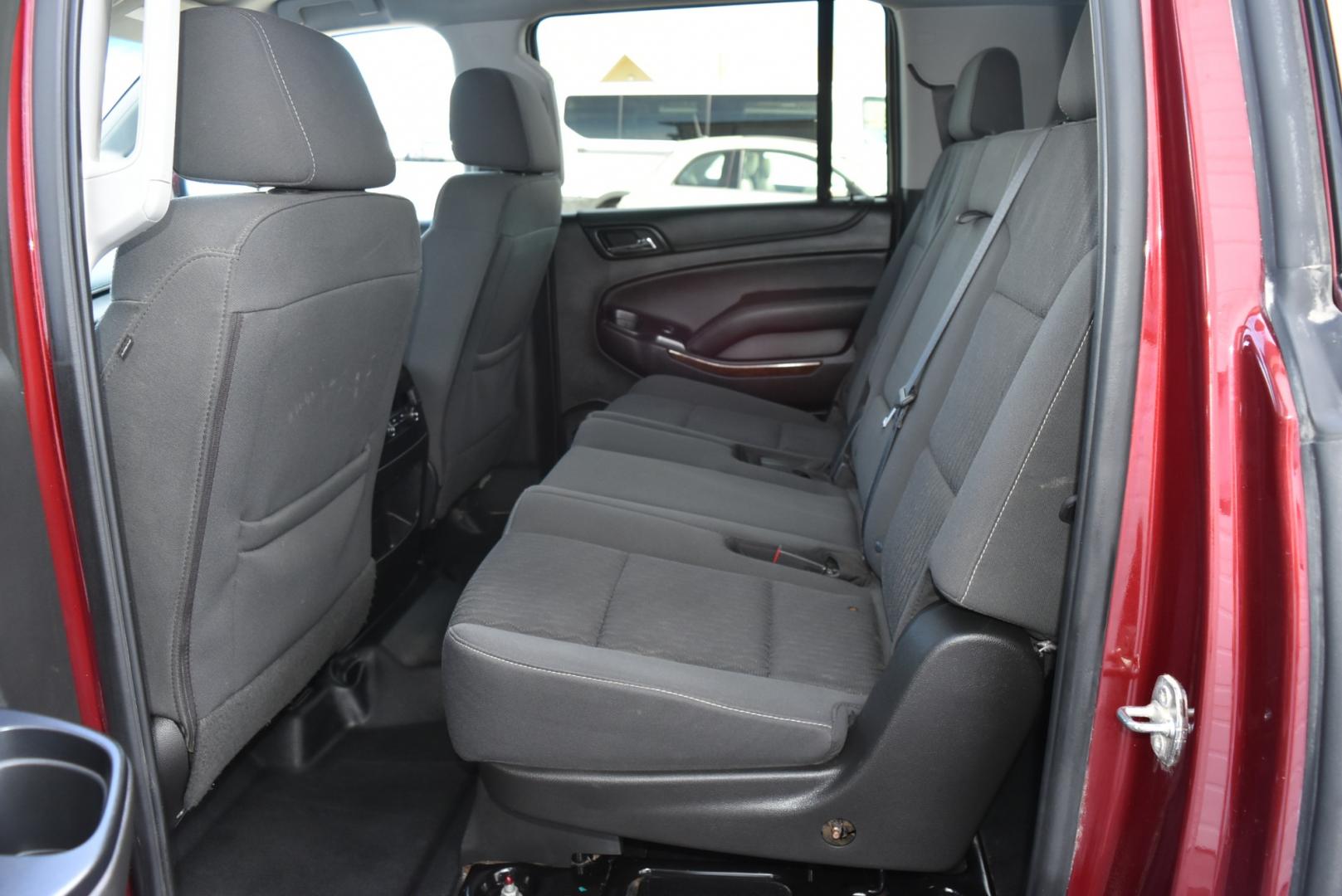 2019 Maroon /Black Chevrolet Suburban LS Fleet (1GNSKKKCXKR) with an 5.3L V-8 engine, 6-Speed Automatic transmission, located at 1600 E Hwy 44, Rapid City, SD, 57703, (605) 716-7878, 44.070232, -103.171410 - Photo#12